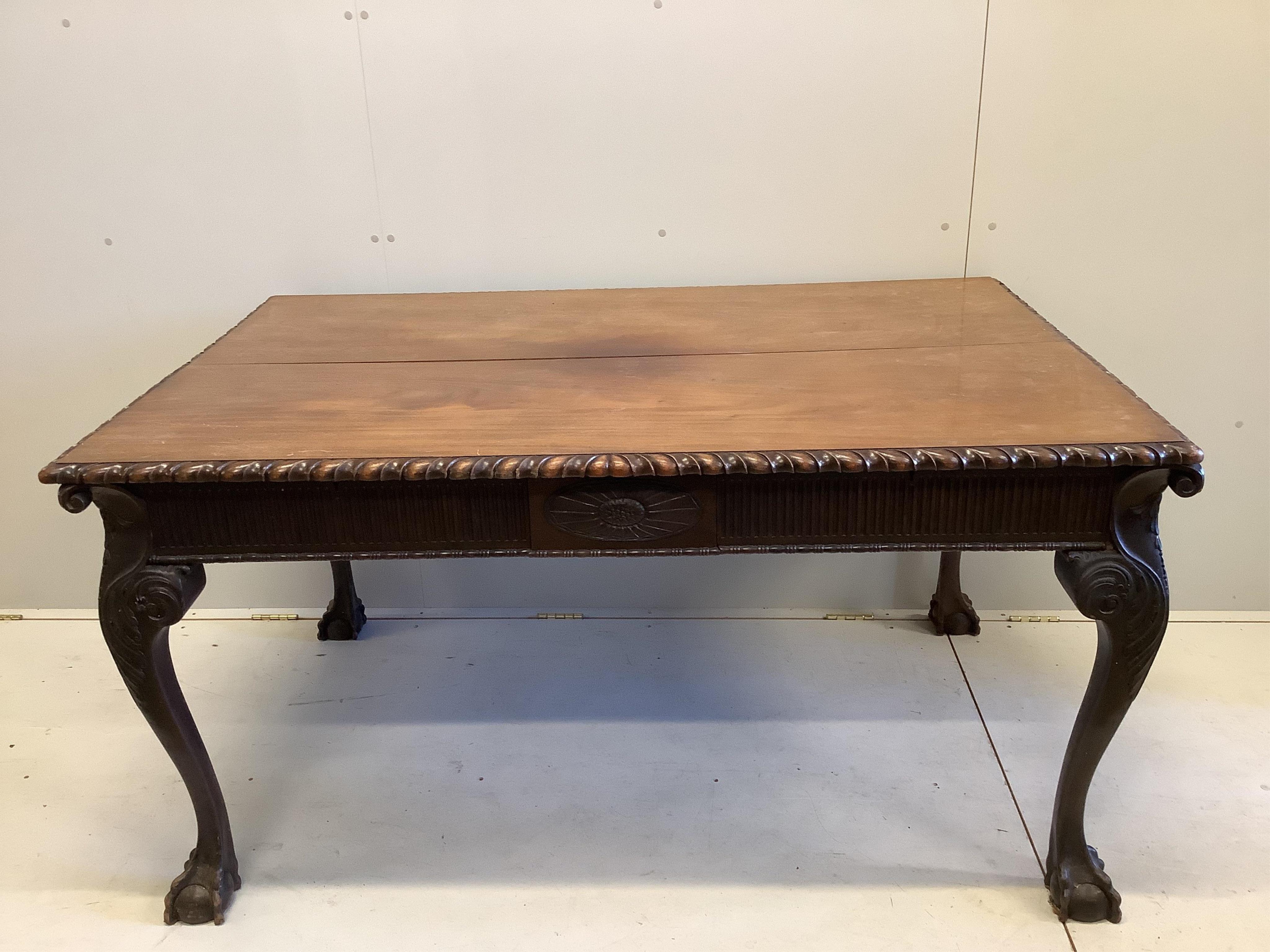 A Chippendale Revival rectangular mahogany table, width 152cm, depth 96cm, height 78cm and four chairs. Condition - fair